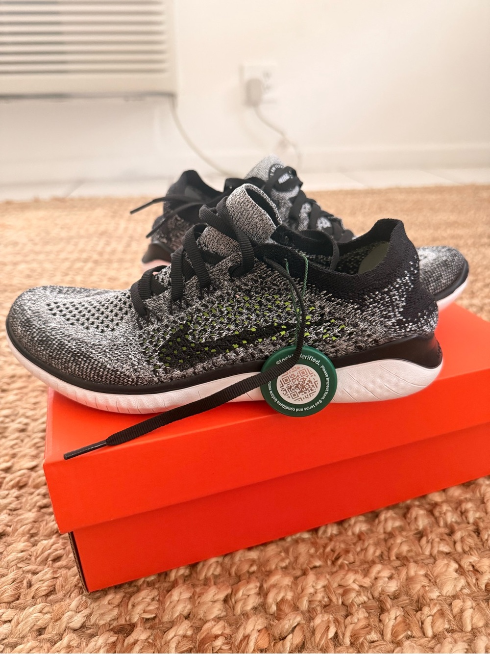 Nike Women’s Black and White Flyknit Running Sneakers